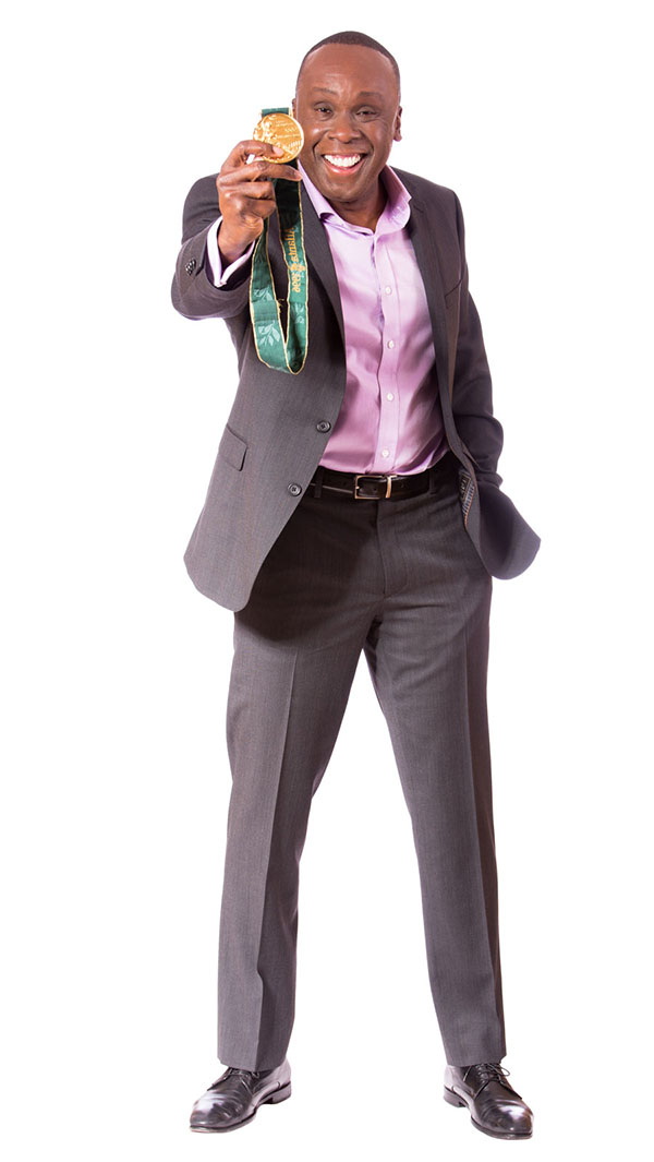 Bruny Surin avec la médaille d'or des Jeux olympiques